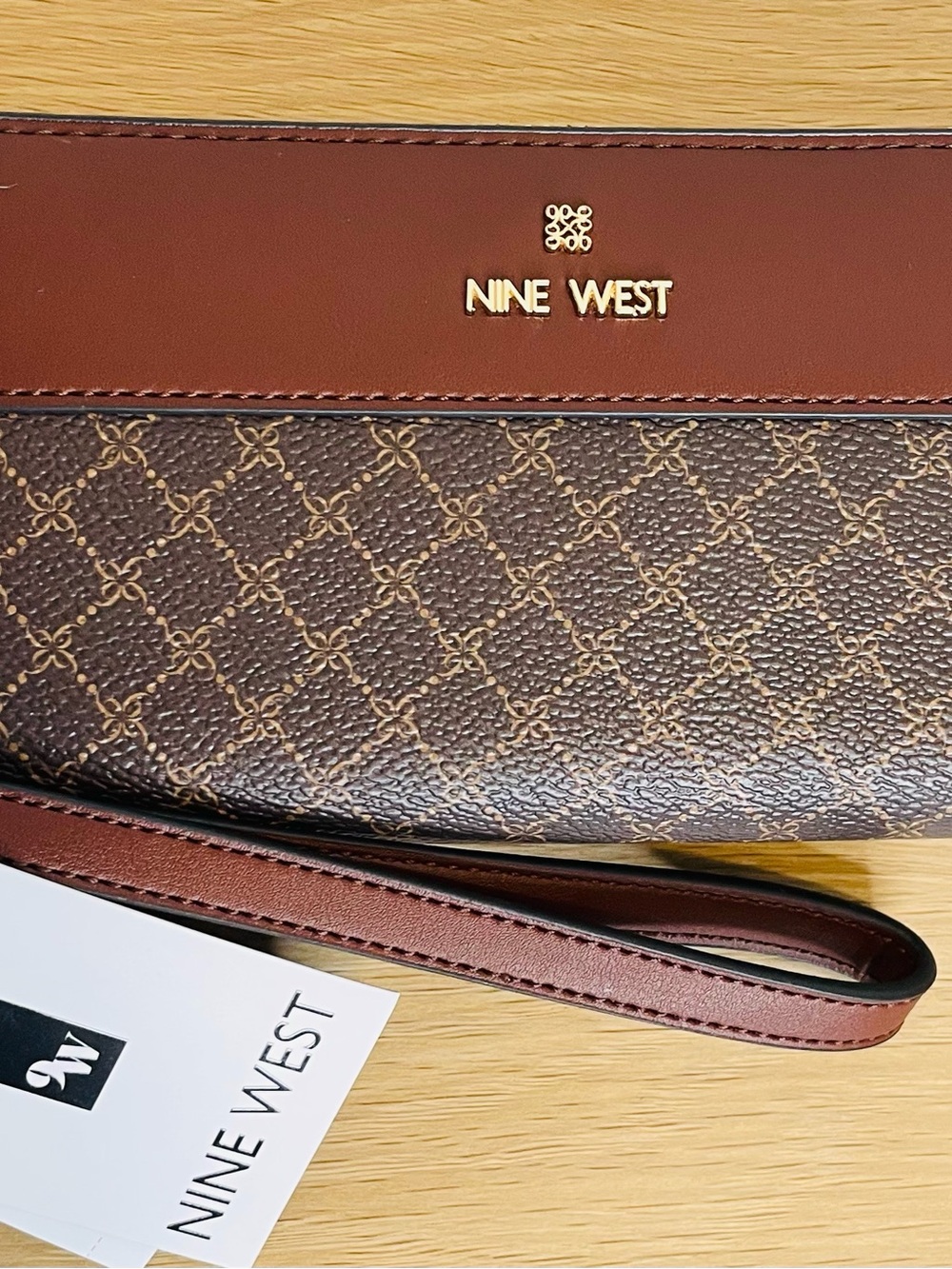 Nine West Brown Monogram Wristlet with Gold Logo